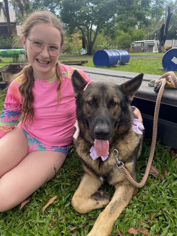 Kim with a trained working-line shepherd on the Gold Coast