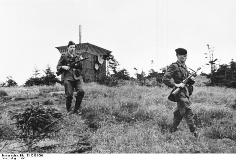 DDR Grenzpolizei border patrol with German Shepherd on the Brocken, East Germany